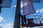 Workers Hang Debate 2020 Signs at Freeman Hall 10 by Belmont University and Sam Simpkins