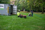 Workers lay cable in preparation by Belmont University and Sam Simpkins