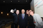 Wesley Clark Poses for a Picture with Audience Members